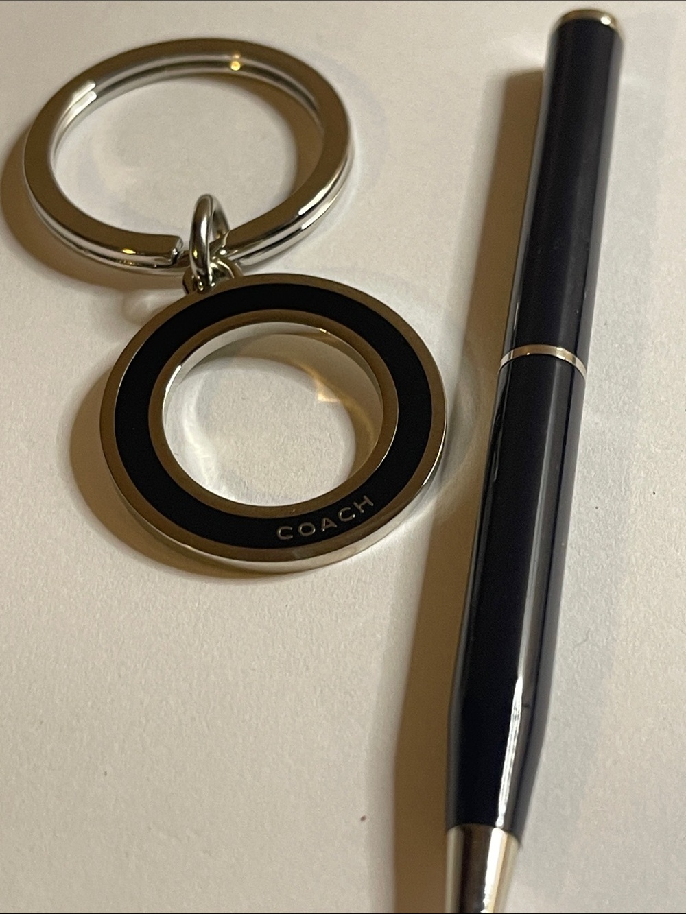 Coach Black & Silver Circular Keyring and Coach Pen